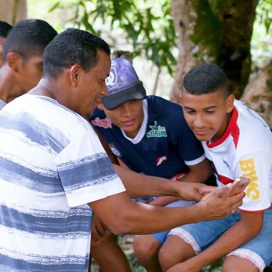 young men connecting to the internet using Viasat Prepaid Internet